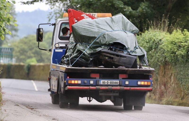 The car Thomas Healy was driving being removed from scene