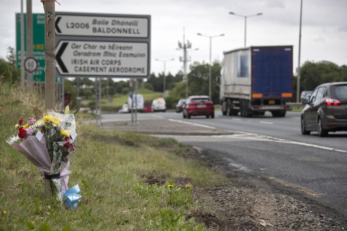 Flowers at the scene of a collision between the lorry and the car. Picture: Colin Keegan, Collins Dublin Flowers at the scene of a collision between the lorry and the car. Picture: Colin Keegan, Collins Dublin