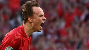 <p>Denmark's forward Mikkel Damsgaard celebrates after scoring the first goal during the UEFA EURO 2020 semi-final football match between England and Denmark at Wembley Stadium in London on July 7, 2021. (Photo by Paul ELLIS / POOL / AFP) (Photo by PAUL ELLIS/POOL/AFP via Getty Images)</p>