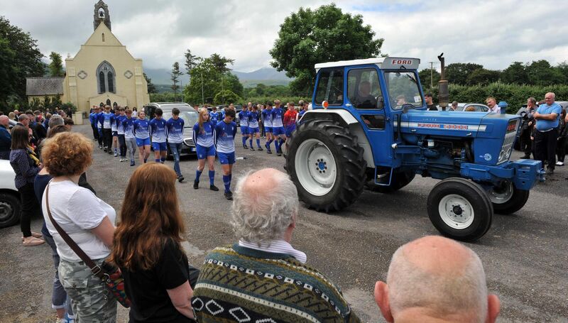 Members of Killarney Athletic Club form a Guard of Honour for the funeral of Thomas Healy.