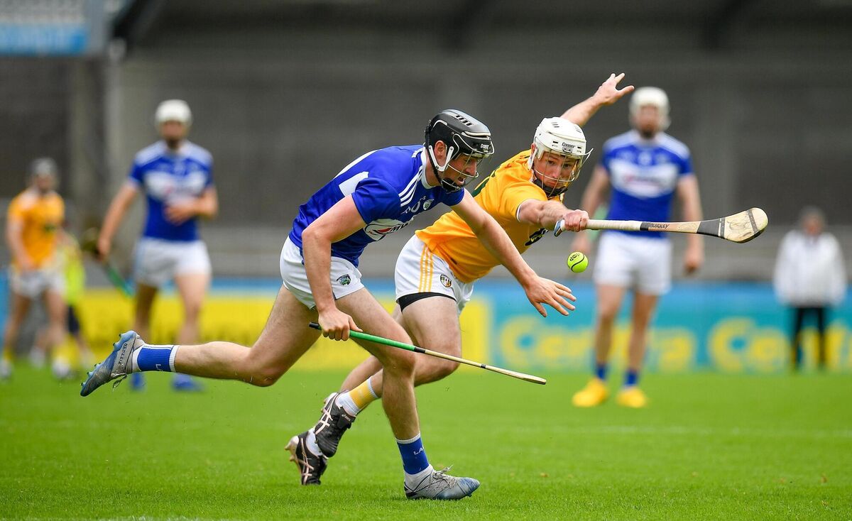 Paddy Purcell of Laois in action against Paddy Burke of Antrim. Picture: Seb Daly/Sportsfile