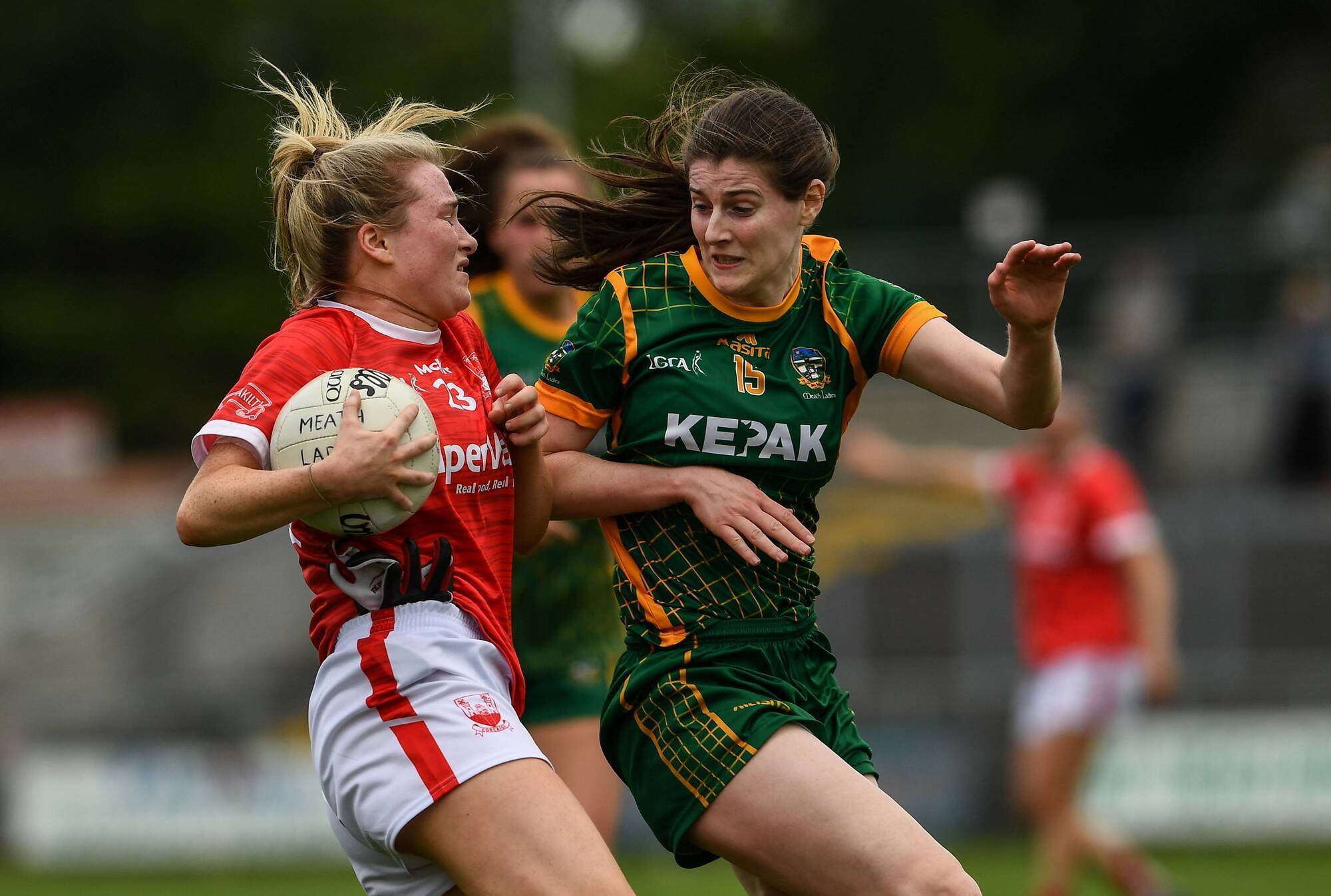 Eimear Kiely of Cork is tackled by Bridgetta Lynch of Meath during the TG4 All-Ireland Senior Ladies Football Championship match in Birr. Picture: Ray McManus/Sportsfile