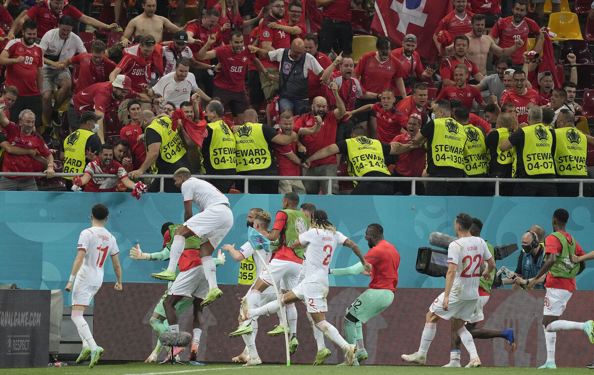 Swiss players celebrate winning the Euro 2020 soccer championship round of 16 match against France Swiss players celebrate winning the Euro 2020 soccer championship round of 16 match against France