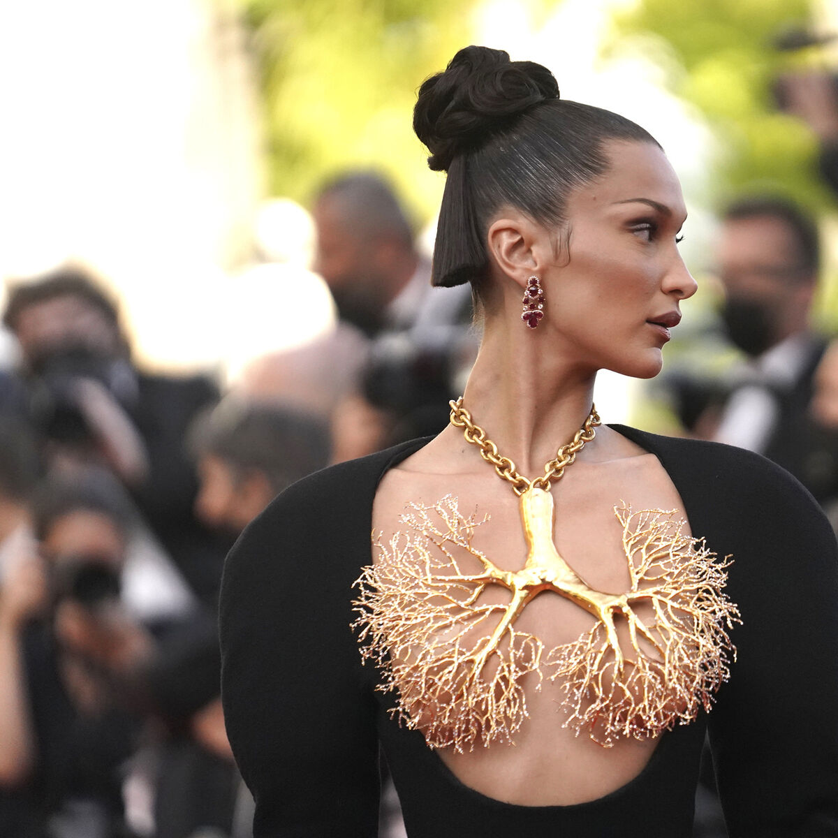 bella hadid black and gold dress Bella Hadid in jaw-dropping outfit on Cannes red carpet