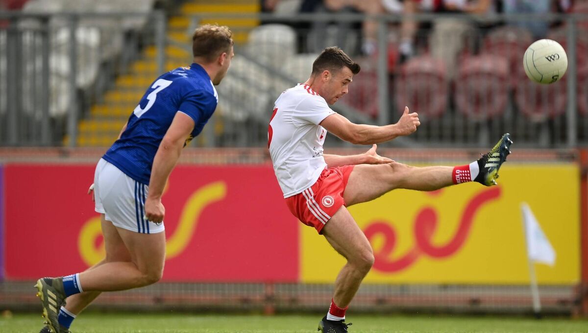 MARKSMAN: Darren McCurry of Tyrone scores another point in the win over Cavan at Omagh. 