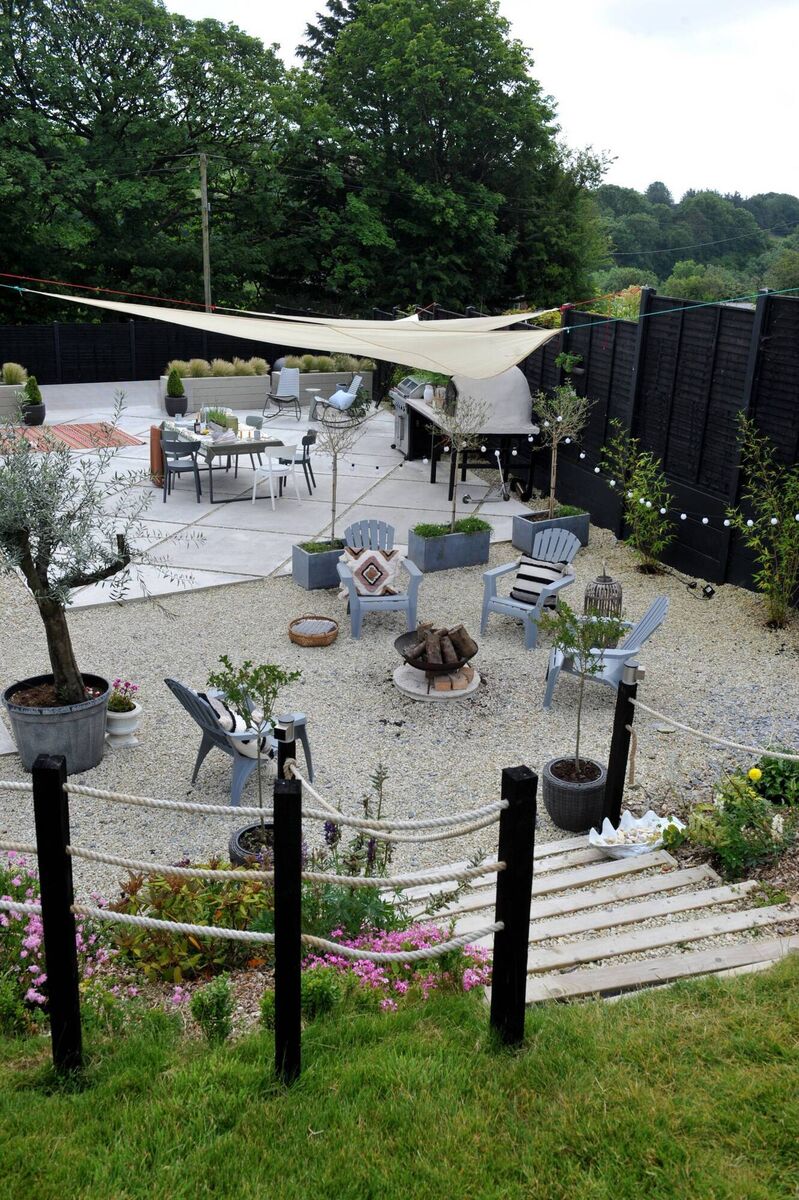 The garden and patio and outdoor kitchen/dining area. The garden and patio and outdoor kitchen/dining area.