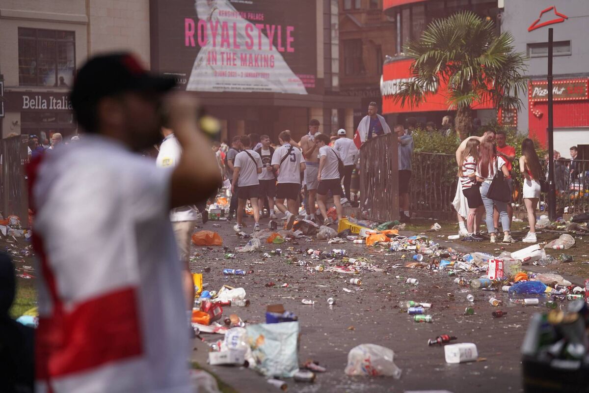 Piles of rubbish left behind by partying England fans in Leicester Square, central London. Picture: PA Piles of rubbish left behind by partying England fans in Leicester Square, central London. Picture: PA