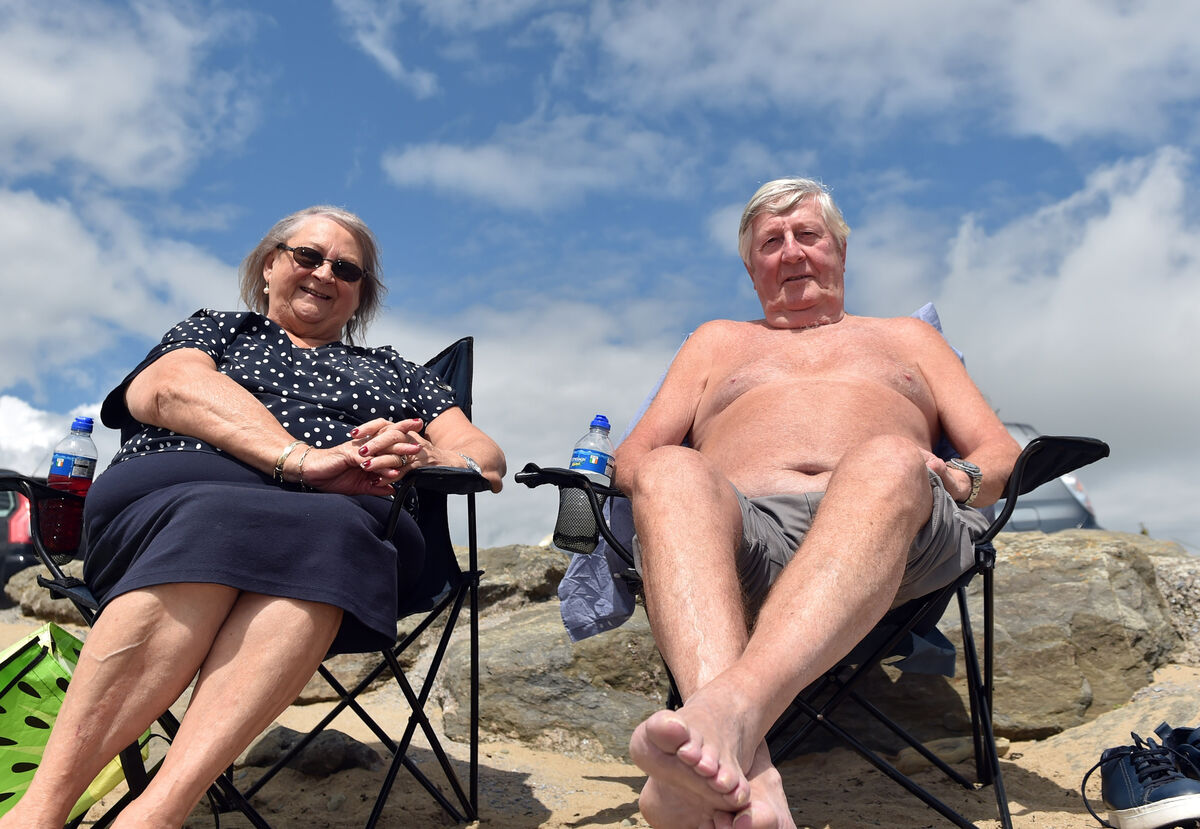 John and Bridie Casey from Ballyphehane at Garrylucas beach in Garrettstown, Co Cork: 'It’s fabulous down here.' Picture: Eddie O'Hare
