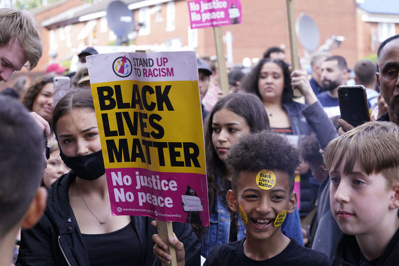 People during a demonstration in support of Manchester United striker and England player Marcus Rashford in front of his mural on the wall of the Coffee House Cafe on Copson Street, Withington. Picture: Danny Lawson/PA Wire People during a demonstration in support of Manchester United striker and England player Marcus Rashford in front of his mural on the wall of the Coffee House Cafe on Copson Street, Withington. Picture: Danny Lawson/PA Wire