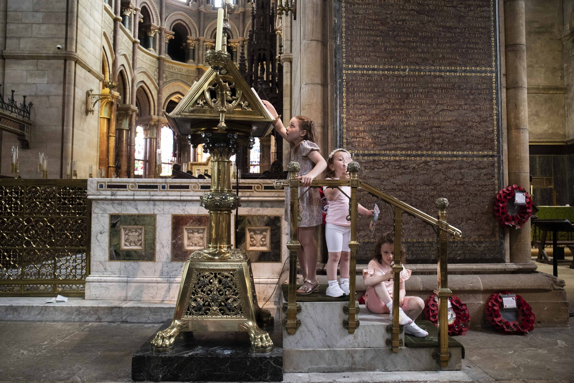 #LetsPlayCork - Six-year-olds Laura Sullivan, from Glanmire, and Olivia Phillips, from Youghal, exploring St Fin Barres Cathedral along with three-year-old Isabel Phillips from Youghal at the launch of the Cork City Playful Culture Trail. Photo: Clare Keogh