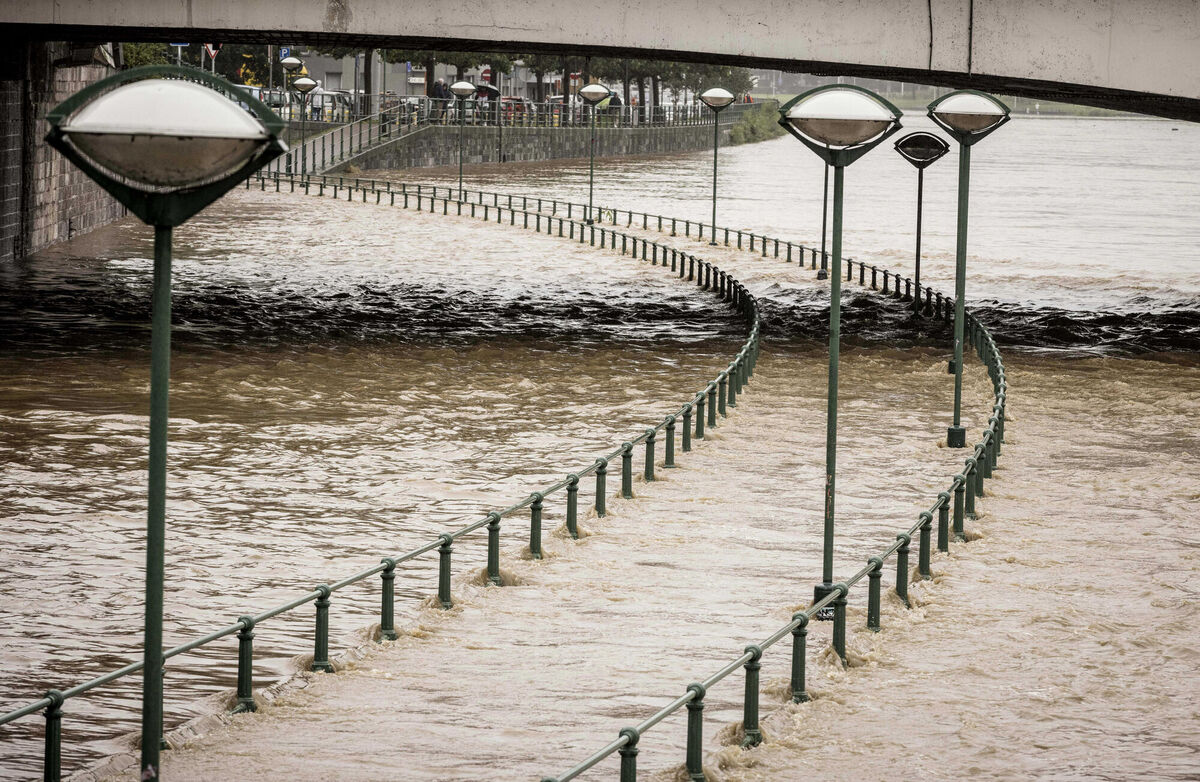 Light posts along a pathway of the Meuse river as it rises during flooding in Liege, Belgium/ Picture: AP Photo/Valentin Bianchi) Light posts along a pathway of the Meuse river as it rises during flooding in Liege, Belgium/ Picture: AP Photo/Valentin Bianchi)