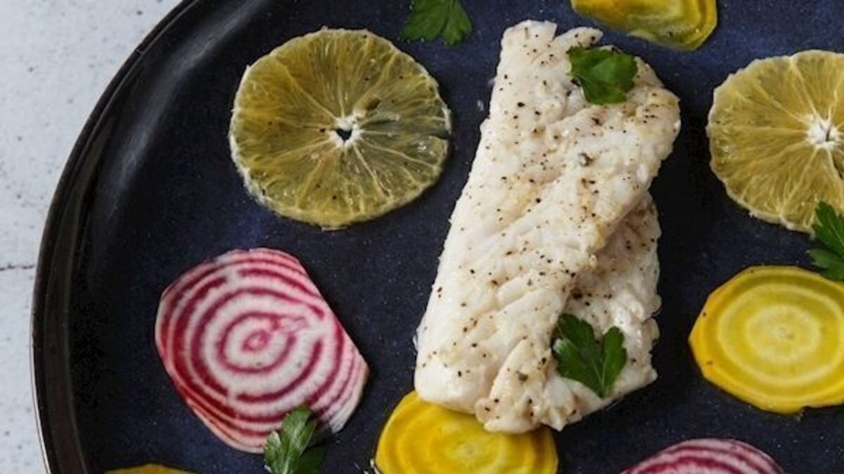 Pan-fried hake with candy beetroot and orange salad