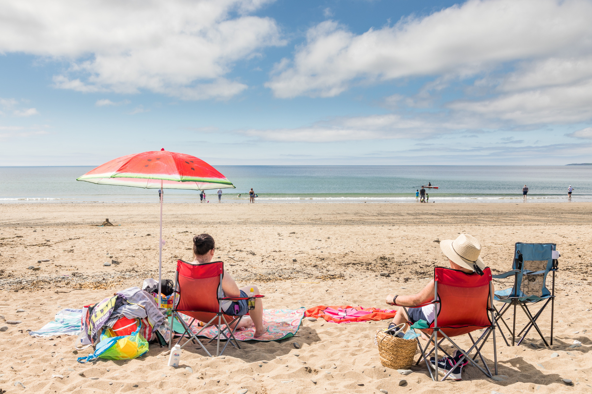 Sunbathers Lynn O'Sullivan and Eleanor Busteed enjoy the fine weather at Garrylucas beach on Thursday.  Picture: David Creedon