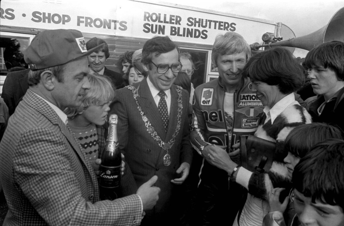 Cork's Lord Mayor, Cllr. Paud Black congratulates Mel Nolan for breaking the Irish Landspeed record on the Carrigrohane Road in Cork on July 16, 1981. Photo: Denis Minihane
