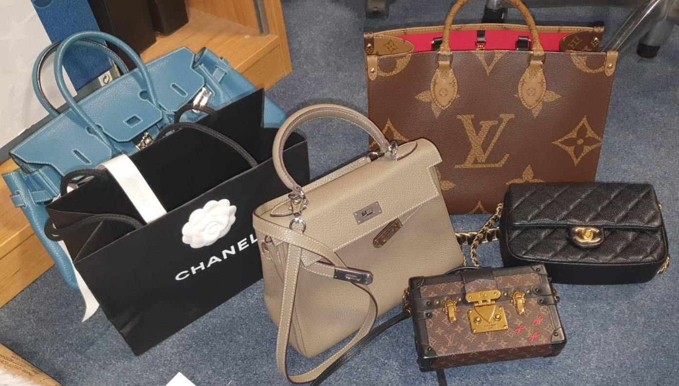Designer handbags, clothes, cash, and over €230k recovered in CAB raid
