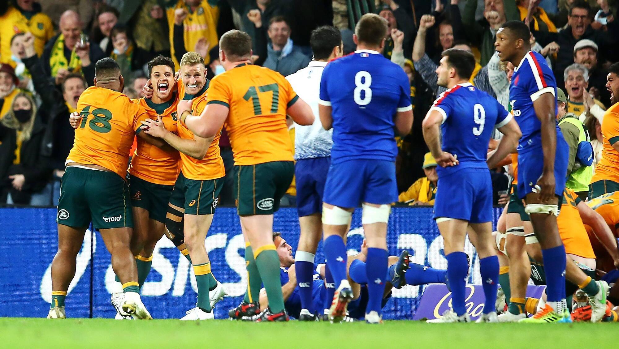 Australia defy controversial red card to defeat France