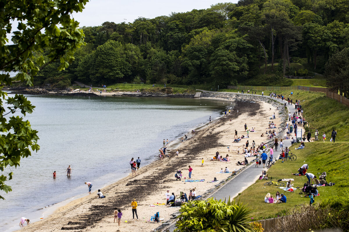 Crowds gather at the beach and along the footpath Helen's Bay in Co. Down Crowds gather at the beach and along the footpath Helen's Bay in Co. Down