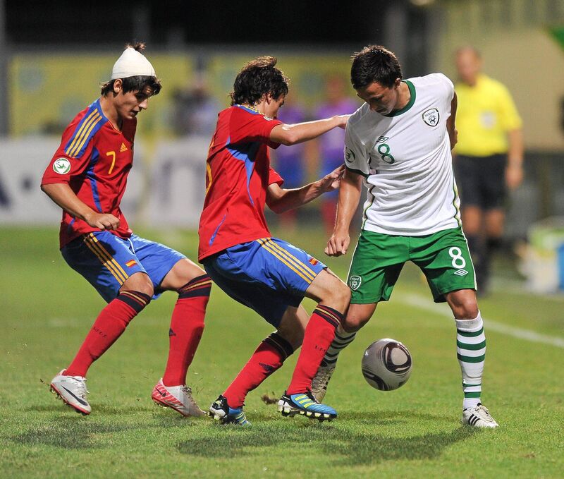 John O’Sullivan in action against Spain’s Rubén Pardo and Álvaro Morata in the semi-final.