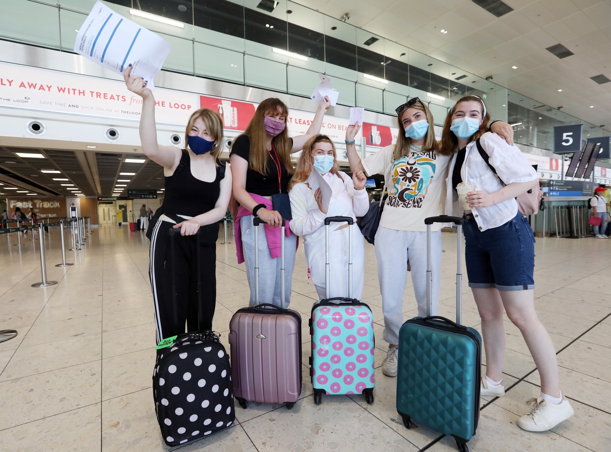 'Emotional day' as restrictions on non-essential international travel ease