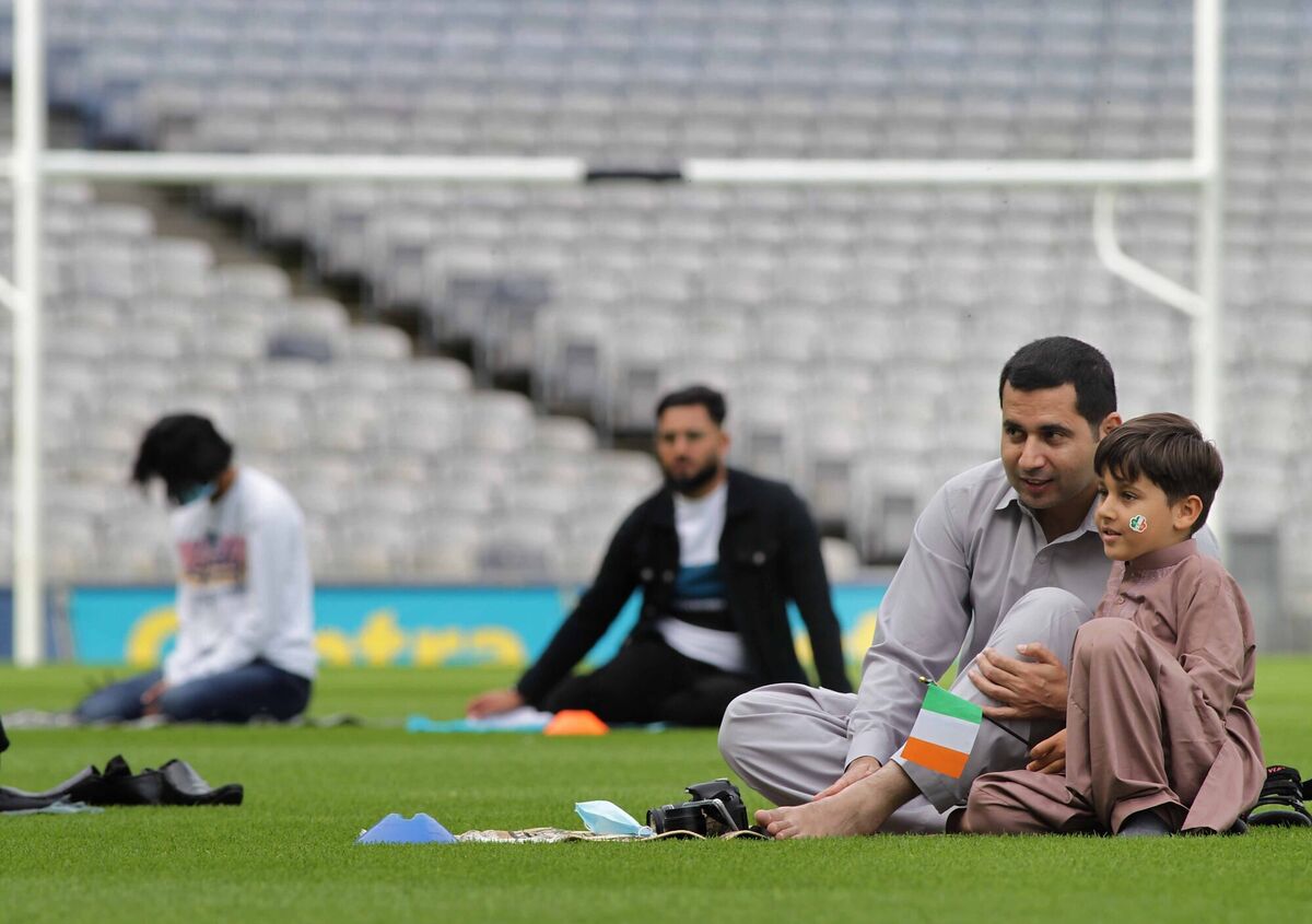  Six-year-old Kamil Ayub with his uncle Saqib Ayub, two of the attendees at the Eid al-Adha event. Picture: Mark Stedman