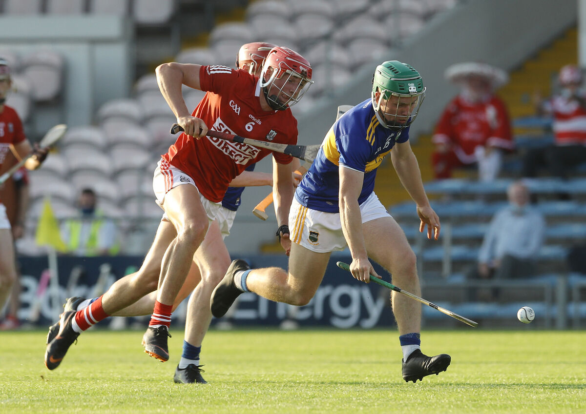 Cork's Ciaran Joyce and James Devaney of Tipperary. Picture: INPHO/Lorraine O'Sullivan
