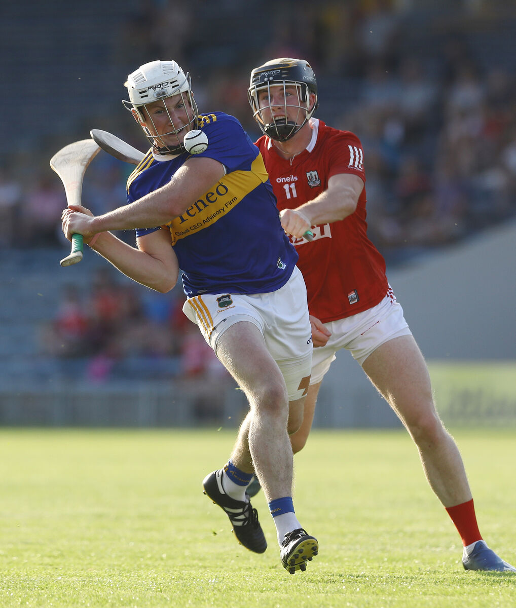 Cork's Daniel Hogan and John Campion of Tipperary. Picture: INPHO/Lorraine O'Sullivan