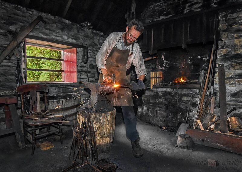 Muckross House resident blacksmith Tom Allison at work on his traditional craft. Muckross House resident blacksmith Tom Allison at work on his traditional craft.