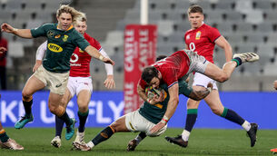 <p>British &amp; Irish Lions' Robbie Henshaw is tackled by Elton Jantjies of South Africa. Picture: INPHO/Dan Sheridan</p>