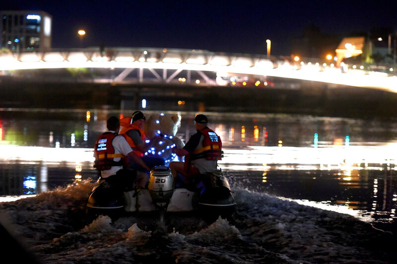  Two rigid inflatable boats, with support from a Port of Cork rib, brought two giant teddy bears up the Lee as the  undersides of the city's bridges were lit up.