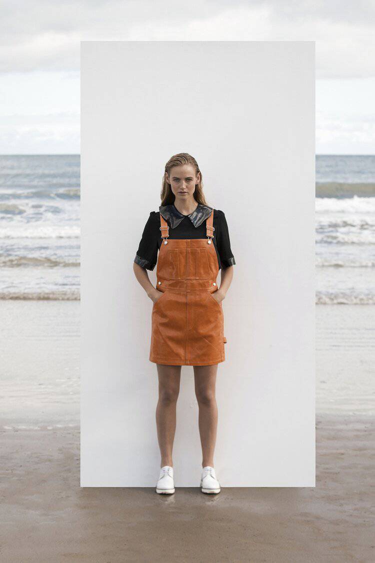 ‘Parker’ leather dungaree dress, €350; ‘Alexa’ top, €199, Manley