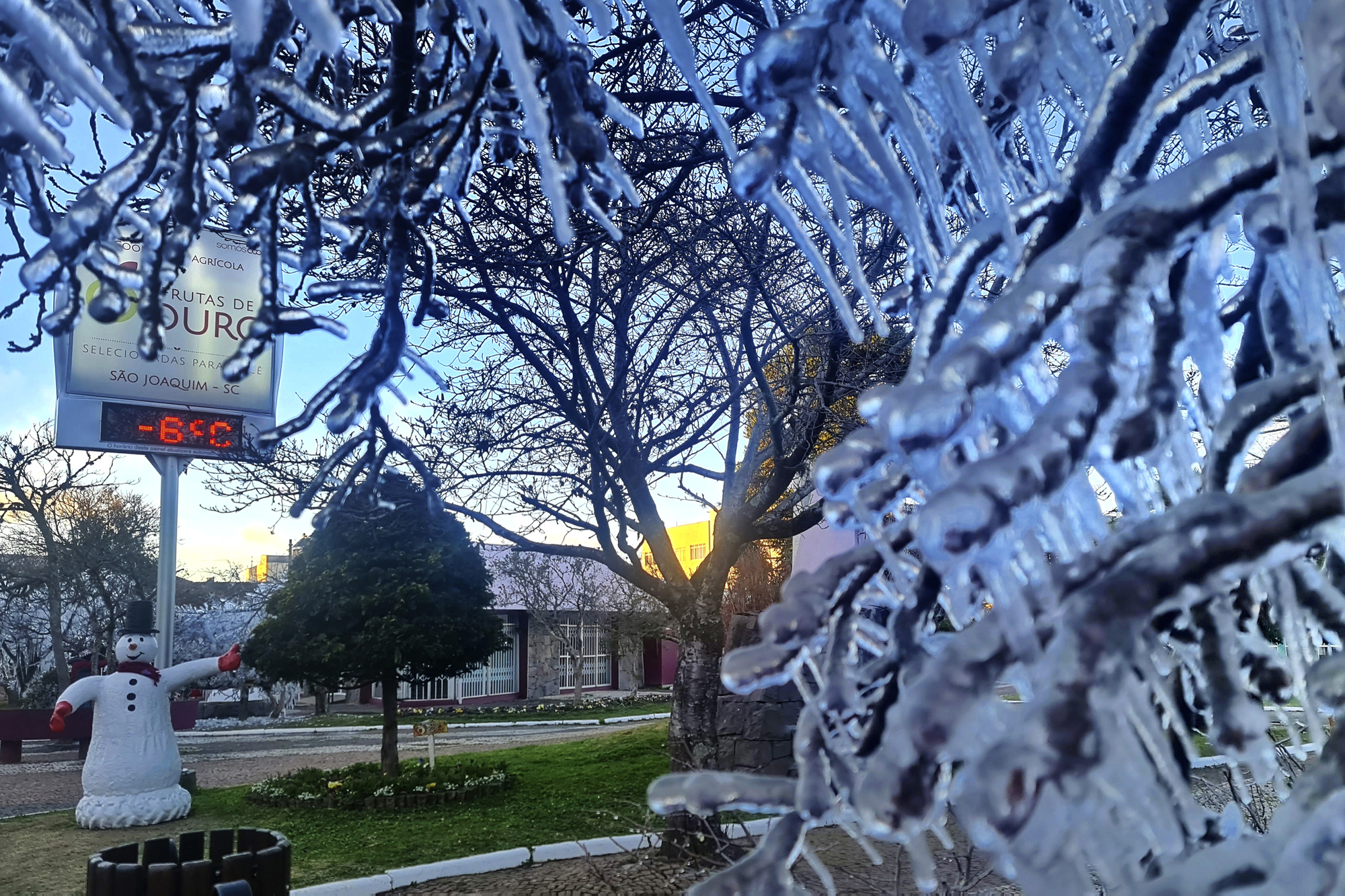 Cold snap sparks rare sight of snowmen and snowballs in Brazil