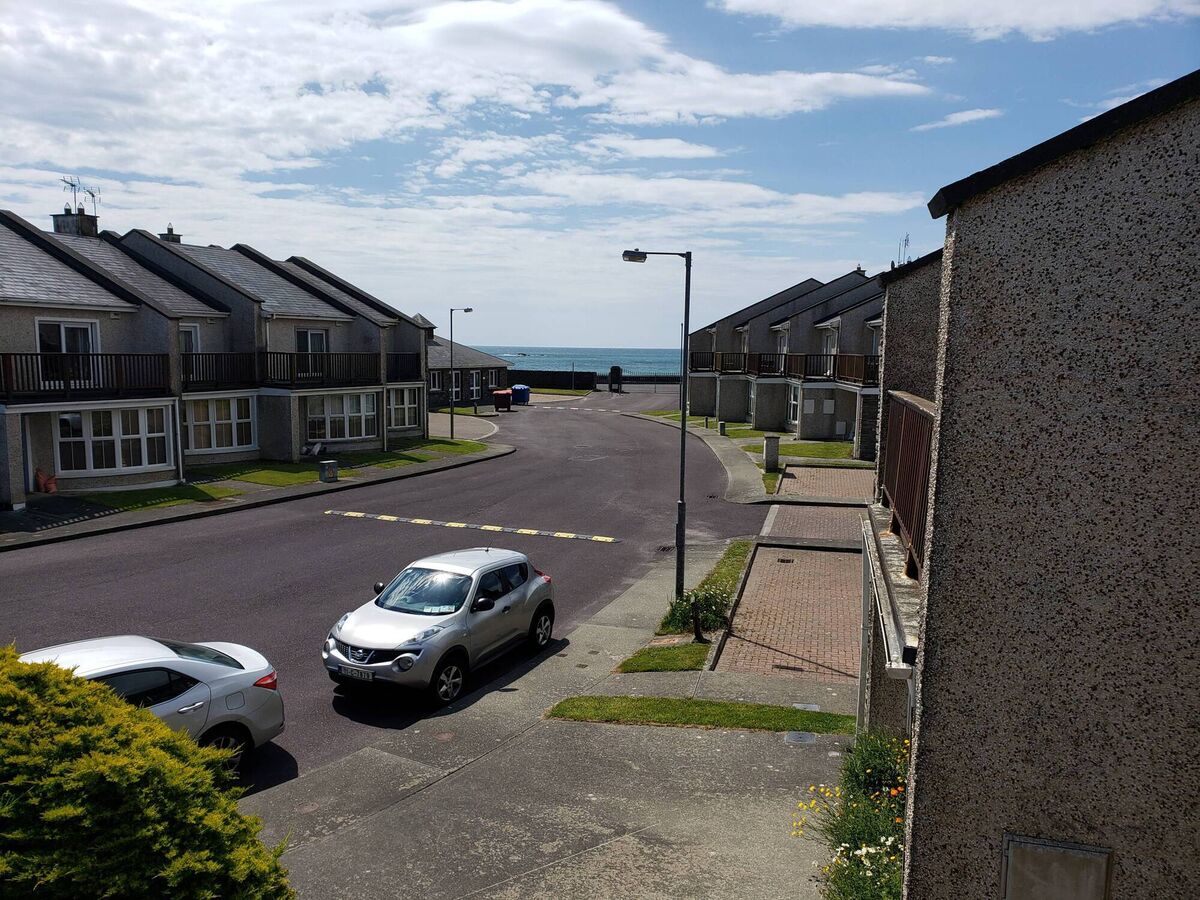 Beach glimpse from 8 Sandycove Villas,   Owenahincha