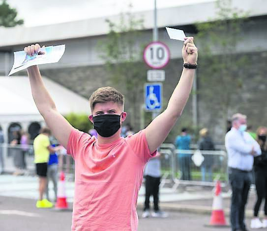 Kealan Foley from Kerry is in celebratory mood after getting his vaccine at a walk-in centre in Killarney.