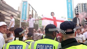 <p>Police walk down Olympic Way during the UEFA Euro 2020 final between Italy and England at Wembley. Picture: Alex Pantling/Getty Images</p>