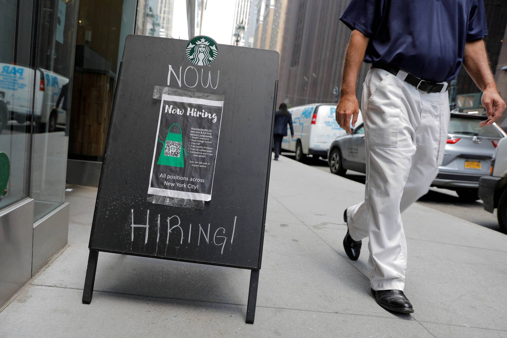 A sign advertising job openings is seen outside of a Starbucks in Manhattan, New York City. Picture: Reuters