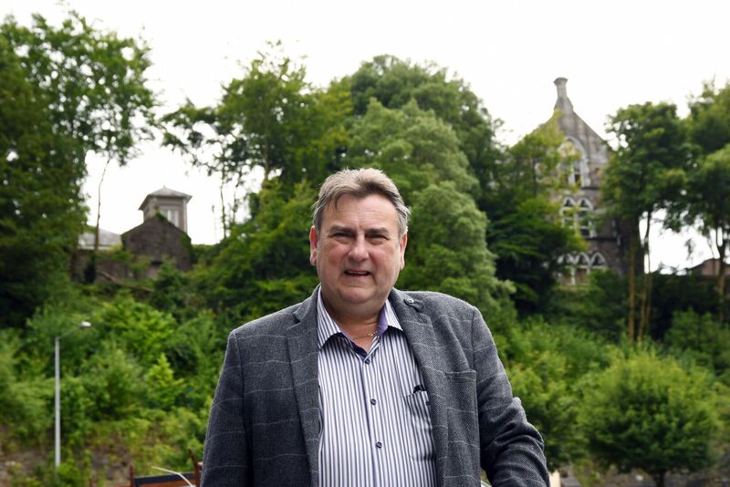 Cllr Noel McCarthy against the backdrop of the empty former Presentation Convent in Fermoy. Picture: Denis Minihane