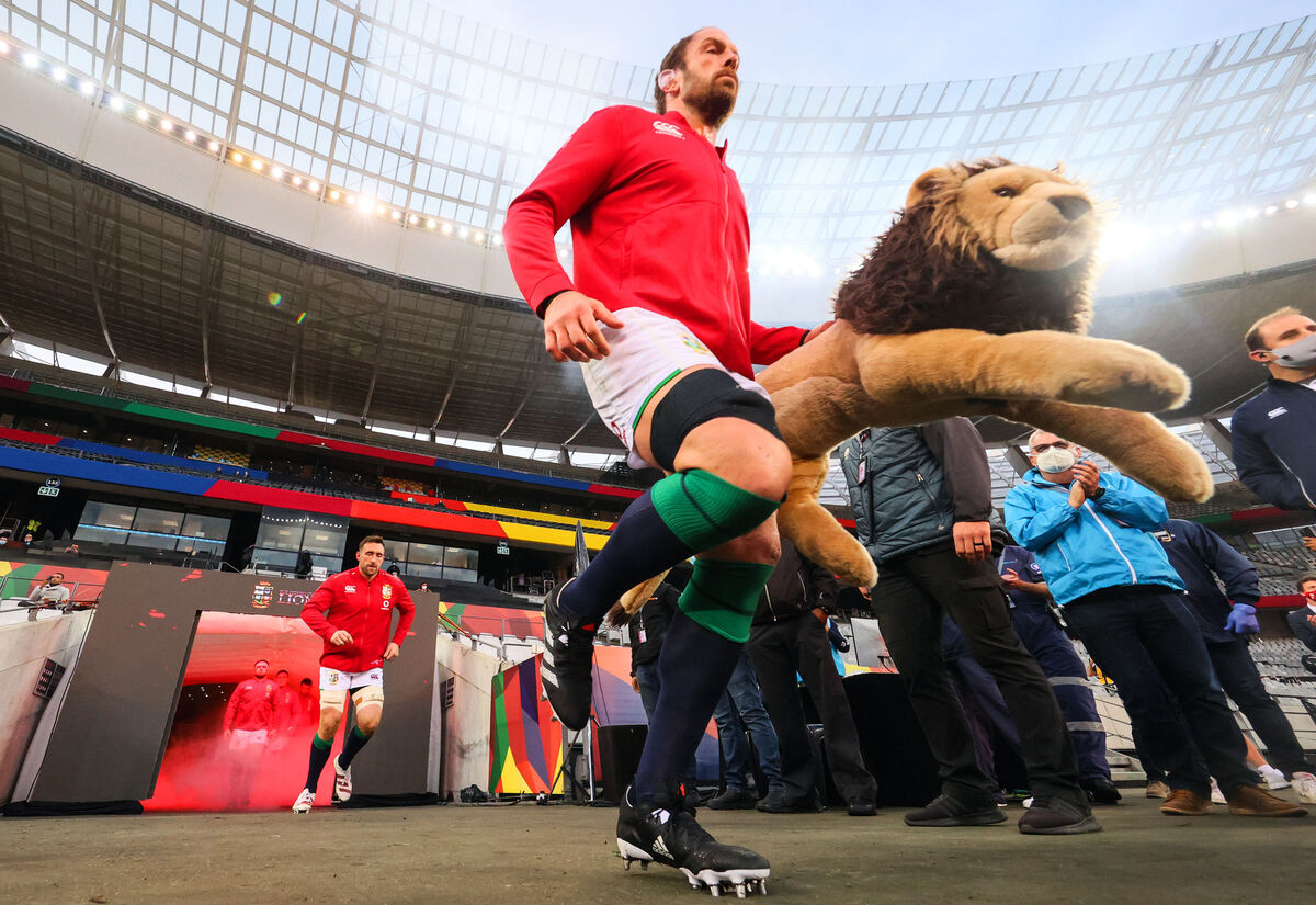 Lions' Alun Wyn Jones leads the team out with mascot BIL. Picture: INPHO/Billy Stickland