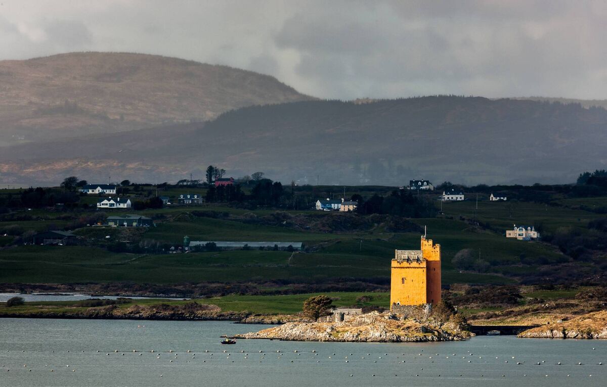 Kilcoe Castle now the home of actor Jeremy Irons is caught in late afternoon sunlight at Roaringwater Bay in West Cork. Picture: David Creedon