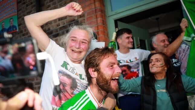Kellie Harrington’s mother Yvonne and brother Christopher celebrate outside their family home in Portland Row. Picture: INPHO/Tommy Dickson Kellie Harrington’s mother Yvonne and brother Christopher celebrate outside their family home in Portland Row. Picture: INPHO/Tommy Dickson