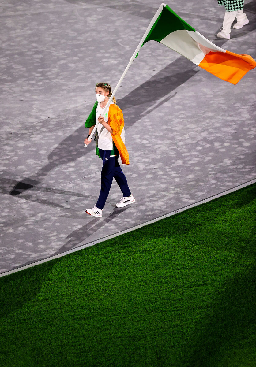 Natalya Coyle carries the flag for Team Ireland at the Closing Ceremony. Picture: INPHO/Bryan Keane