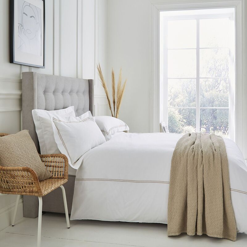  Go completely neutral with gleaming white Lexington duvet cover, warmed with creams and pale grey for a relaxing atmosphere (from €37.25 at www.thefinecottoncompany.com).