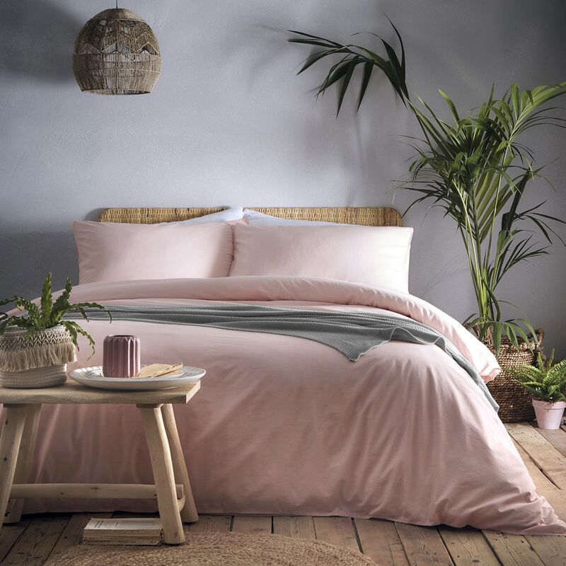  Very.co.uk's Appletree Cassia duvet cover is set against a grey and blond wood scheme accented with greenery for a fresh but cosy look (from €50).