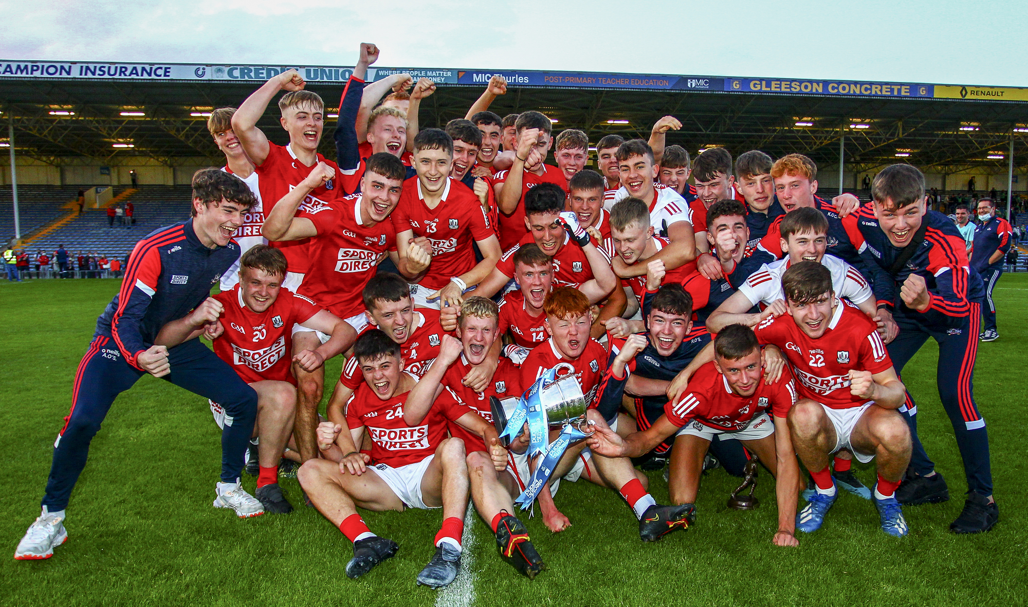 The Cork team celebrate with the Tadhg Crowley Cup. Picture: INPHO/Ken Sutton