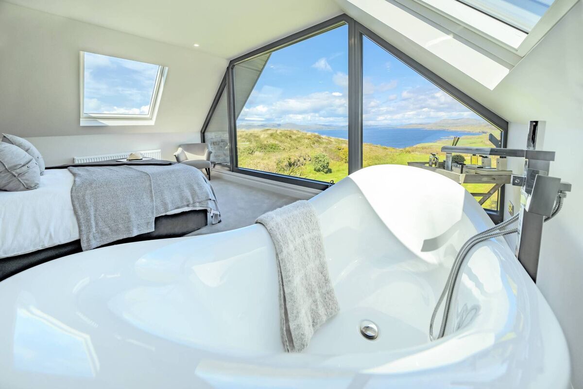 Wet, wet, wet. Roll top bath in the main bedroom to soak up the sea views