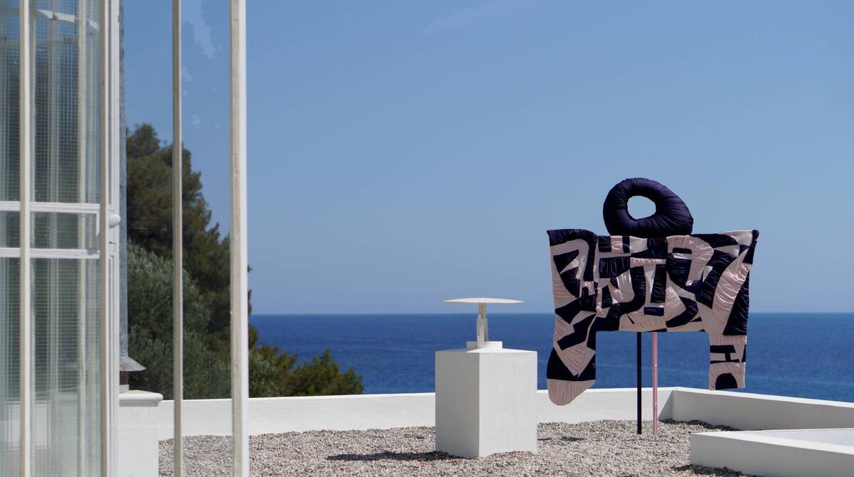 An abstract creation made from recycled jersey, wadding, powder-coated steel, and cotton by Richard Malone at Making and Momentum: Eileen Gray In Conversation. An abstract creation made from recycled jersey, wadding, powder-coated steel, and cotton by Richard Malone at Making and Momentum: Eileen Gray In Conversation.