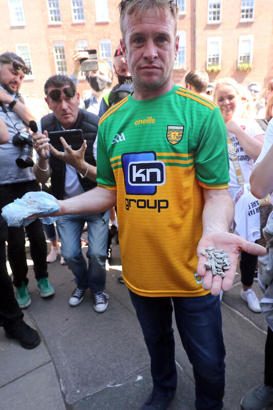 Paddy Diver, mica campaigner and co-founder of '100% Redress No Less’, with supporters as he entered Leinster House on June 15 to speak to Housing Minister Darragh O'Brien. File Picture: Niall Carson/PA Wire