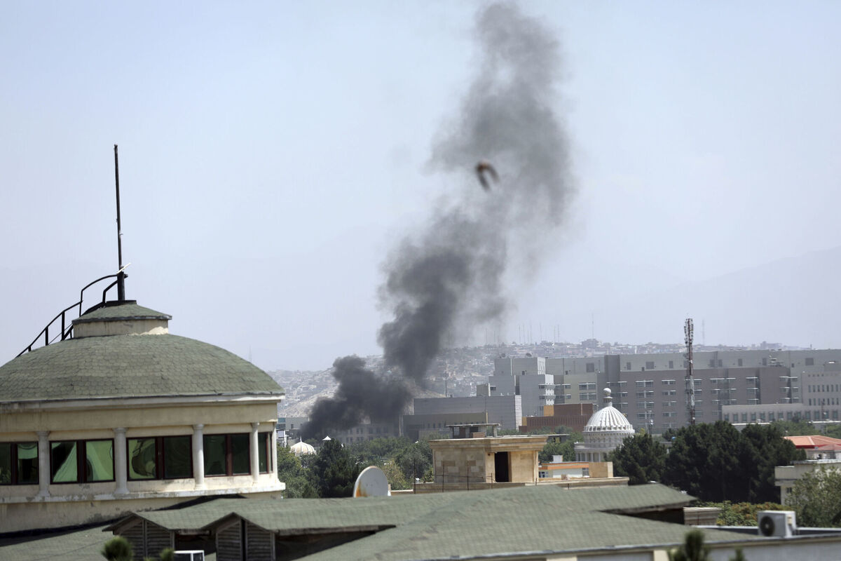 Taliban fighters entered the outskirts of the Afghan capital on Sunday, further tightening their grip on the country as panicked workers fled government offices and helicopters landed at the embassy. Wisps of smoke could be seen near the embassy's roof as diplomats urgently destroyed sensitive documents, according to two American military officials. Picture: AP Photo/Rahmat Gul Taliban fighters entered the outskirts of the Afghan capital on Sunday, further tightening their grip on the country as panicked workers fled government offices and helicopters landed at the embassy. Wisps of smoke could be seen near the embassy's roof as diplomats urgently destroyed sensitive documents, according to two American military officials. Picture: AP Photo/Rahmat Gul