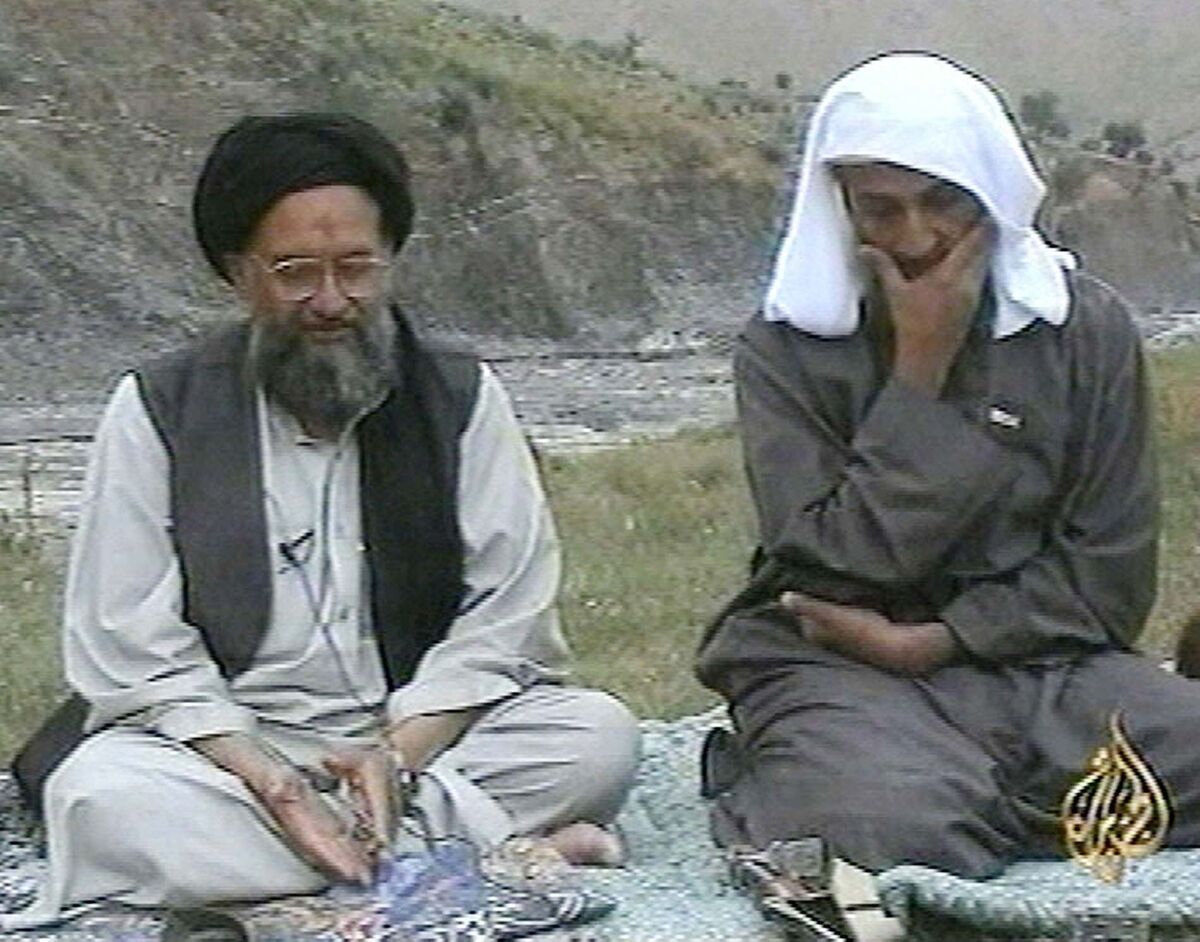 Osma bin Laden, right, listens as his top deputy Ayman al-Zawahri speaks in 2002.