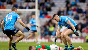 <p>Dublin's John Small with Eoghan McLaughlin of Mayo after the challenge that went unpunished by the match referee. Picture: INPHO/Tommy Dickson</p>