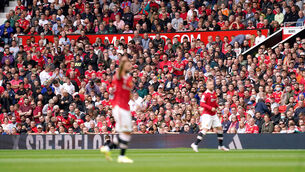<p>A general view of the fans during the Premier League match at Old Trafford</p>